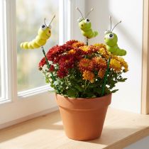 kohteita Puinen toukka tikussa vihreä, keltainen 8cm 24 kpl