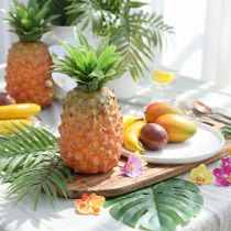 kohteita Keinotekoinen koristeananas 26 cm – petollisen realistinen tekohedelmä, koristehedelmä buffetteihin ja esillepanoihin