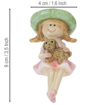 kohteita Hyllyn istuja Hymyilevä tyttö koiran kanssa Ø4,5cm K9,5cm