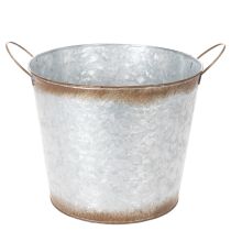 kohteita Kukkaruukku kahvoilla, koristeellinen kulho ruosteenvärisellä pinnalla, hopeanvärinen metalliastia Ø26cm, korkeus 25.5cm