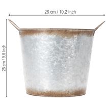 kohteita Kukkaruukku kahvoilla, koristeellinen kulho ruosteenvärisellä pinnalla, hopeanvärinen metalliastia Ø26cm, korkeus 25.5cm