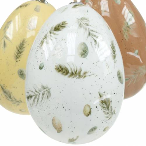 kohteita Pääsiäismunat ripustettavaksi motiivimunilla ja höyhenillä valkoinen, ruskea, keltainen lajitelma 3kpl