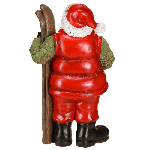 kohteita Joulupukin koristefiguuri maalattu suksilla 14×10,5×24,5 cm
