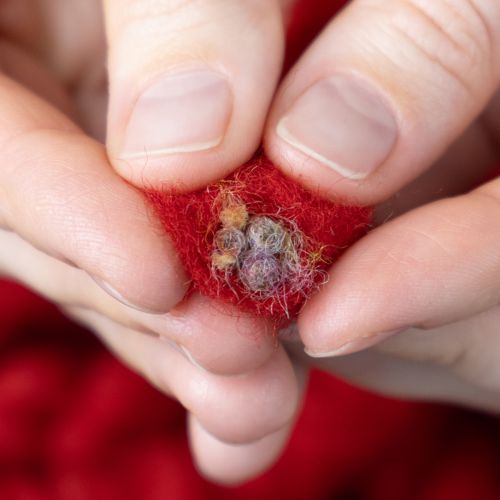 kohteita Pörröinen Mirabell-villanyöri juutilla, punainen, 25m