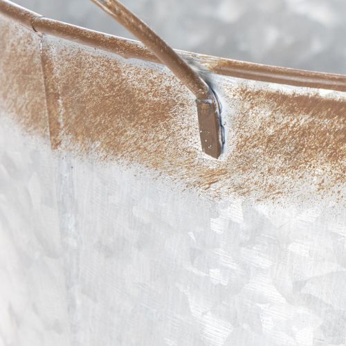 kohteita Kukkaruukku kahvoilla, koristeellinen kulho ruosteenvärisellä pinnalla, hopeanvärinen metalliastia Ø26cm, korkeus 25.5cm